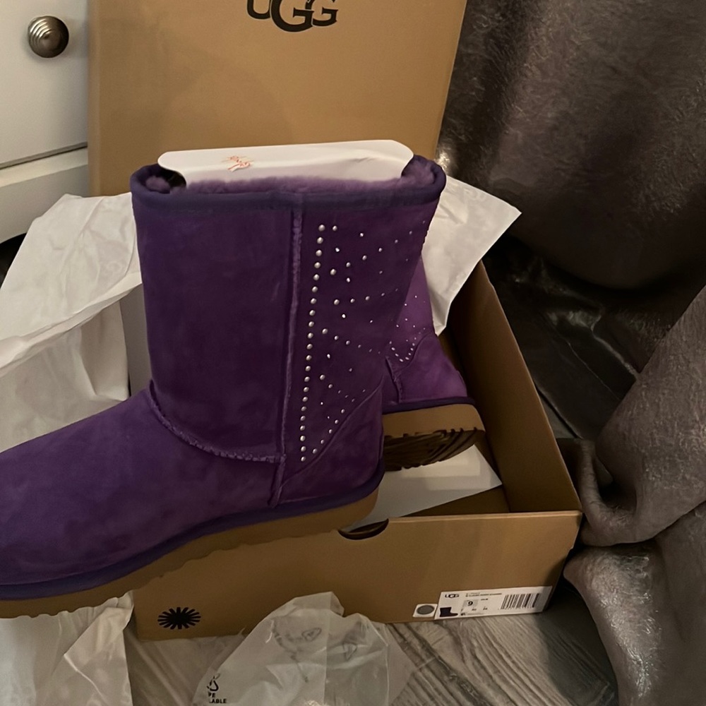 Brand new, purple UGG boots with silver stud design,  size 9 in box.